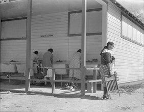Some of the facilities of the Kern County migrant camp, California, 1936. Creator: Dorothea Lange.