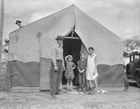 Migrant family in Kern County, California, 1936. Creator: Dorothea Lange.