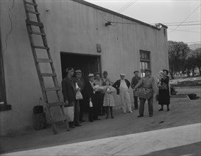 Self-help cooperative, members of the community, Burbank, California, 1936. Creator: Dorothea Lange.
