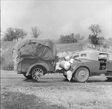 An oil worker builds himself a trailer and takes to the road, California, 1936. Creator: Dorothea Lange.