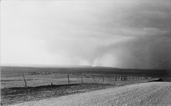Dust storm near Mills, New Mexico, 1935. Creator: Dorothea Lange.
