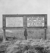Employment signs in Spanish and English, near Fresno, California, 1933. Creator: Dorothea Lange.