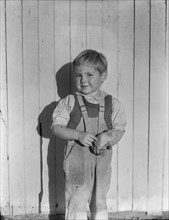 Youngest child of four of rural rehabilitation client, Near San Fernando, California, 1935. Creator: Dorothea Lange.