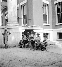 Saturday afternoon in front of the courthouse, Greenville [i.e., Greeneville], Tennessee, 1936. Creator: Dorothea Lange.