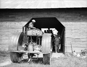 North Carolina threshing, 1936. Creator: Dorothea Lange.