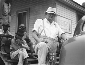 Plantation overseer, Mississippi Delta, near Clarksdale, Mississippi, 1936. Creator: Dorothea Lange.