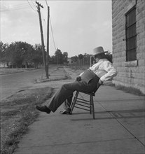 The sheriff of McAlester, Oklahoma, sitting in front of the jail, 1936. Creator: Dorothea Lange.