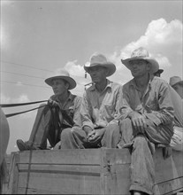 Arkansas sharecroppers going home, Near Blytheville, Arkansas, 1936. Creator: Dorothea Lange.