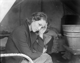 Daughter of migrant Tennessee coal miner, living in American River camp..., CA, 1936. Creator: Dorothea Lange.