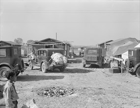 Housing for migratory workers in cotton, five miles north of Corcoran, California, 1936. Creator: Dorothea Lange.