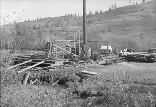 Ola self-help sawmill under construction, Idaho, 1939. Creator: Dorothea Lange.