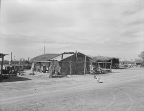 Housing typical of that afforded Mexican field workers of the Imperial Valley, 1937. Creator: Dorothea Lange.