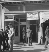Employment agency on Howard Street, San Francisco, California, 1937. Creator: Dorothea Lange.