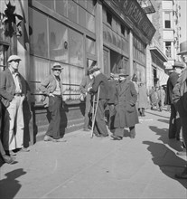 Skid Row, Howard Street, the street of the unemployed in San Francisco, California, 1937. Creator: Dorothea Lange.