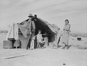 Family of four to be returned to Oklahoma by the Relief Administration, Holtville, California, 1937. Creator: Dorothea Lange.