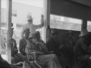 Waiting for the relief checks at Calipatria, California, 1937. Creator: Dorothea Lange.