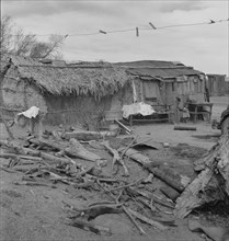 Ditch bank housing for Mexican field workers, Imperial Valley, California, 1937. Creator: Dorothea Lange.