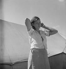 Woman in pea picker's camp, California, 1937. Creator: Dorothea Lange.