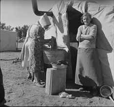 Oklahomans, drought refugees in a southern California squatter's camp, 1937. Creator: Dorothea Lange.
