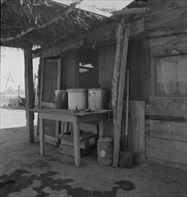 Porch of Mexican worker's home in East El Centro, Imperial Valley, California, 1937. Creator: Dorothea Lange.