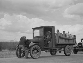 Oklahoma drought refugees stalled on highway near Lordsburg, New Mexico, 1937. Creator: Dorothea Lange.