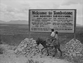 Sign entering Tombstone, Arizona, 1937. Creator: Dorothea Lange.