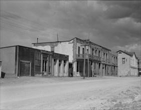 Scene in Tombstone, Arizona, once a thriving mining town, 1937. Creator: Dorothea Lange.
