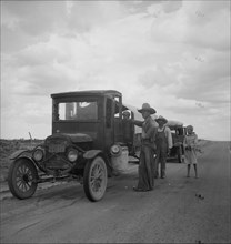Drought refugees stopped along the highway near Lordsburg, New Mexico, 1937. Creator: Dorothea Lange.