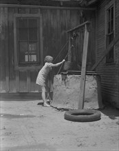 One of a Texas sharecropper's ten children, Hall County, Texas, 1937. Creator: Dorothea Lange.