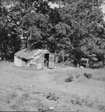 Family camped on U.S. Highway 63, Cache County, Oklahoma, 1937. Creator: Dorothea Lange.