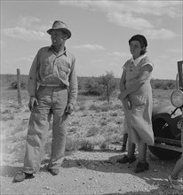 Migrant oil worker and wife near Odessa, Texas, 1937. Creator: Dorothea Lange.