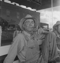 Dust bowl farmers of west Texas in town, 1937. Creator: Dorothea Lange.