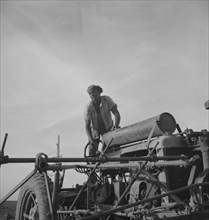 Negro tractor driver, Aldridge Plantation, Mississippi, 1937. Creator: Dorothea Lange.