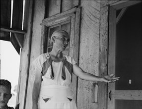 Grandmother of sharecropper family near Cleveland, Mississippi, 1937. Creator: Dorothea Lange.