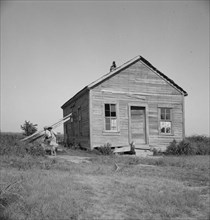 School in center of the mechanized plantation area of the Mississippi Delta, 1937. Creator: Dorothea Lange.