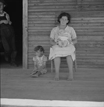 Families are left stranded without means of support..., Near Kiln, Mississippi, 1937. Creator: Dorothea Lange.