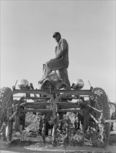 Tractor on Lake Dick project, Arkansas, 1938. Creator: Dorothea Lange.