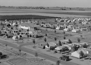 Farm Security Administration camp for migrant agricultural workers at Shafter, California, 1938. Creator: Dorothea Lange.