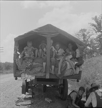 On highway no. 1 of the "OK" state near Webbers Falls, Muskogee County, Oklahoma, 1938. Creator: Dorothea Lange.