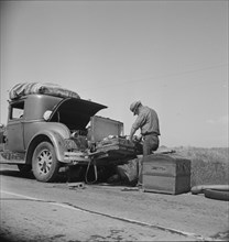 Car trouble on west side, Highway no33, San Joaquin Valley, 1938. Creator: Dorothea Lange.