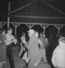 Halloween party at Shafter Camp for migrant agricultural workers, California, 1938. Creator: Dorothea Lange.
