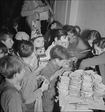 The children at Halloween party in Shafter migrant camp, California, 1938. Creator: Dorothea Lange.