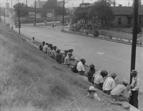 Waiting for the trucks to bring them to the cotton fields, Memphis, Tennessee, 1937. Creator: Dorothea Lange.
