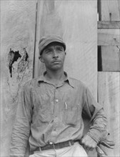 Member of the Delta cooperative farm, Hillhouse, Mississippi, 1937. Creator: Dorothea Lange.