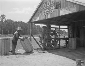 Turpentine still near Valdosta, Georgia, 1937. Creator: Dorothea Lange.