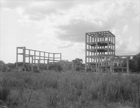 What is left of the alcohol plant, built to utilize refuse, Fullerton, Louisiana, 1937. Creator: Dorothea Lange.