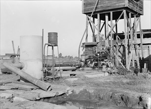Pumping plant for irrigation powered by a natural gas engine, Tulare County, California, 1938. Creator: Dorothea Lange.