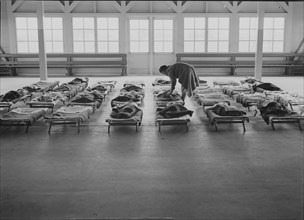 Rest time in nursery school for migrant children at Shafter Camp, California, 1939. Creator: Dorothea Lange.