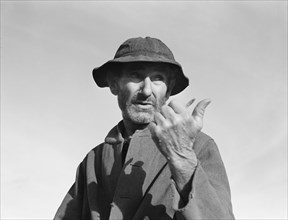 Cotton picker near Firebaugh, California, 1939. Creator: Dorothea Lange.