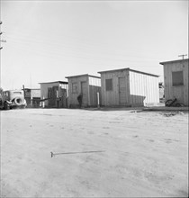 Newly-built cabins, rent five dollars per month, near Bakersfield, California , 1939. Creator: Dorothea Lange.